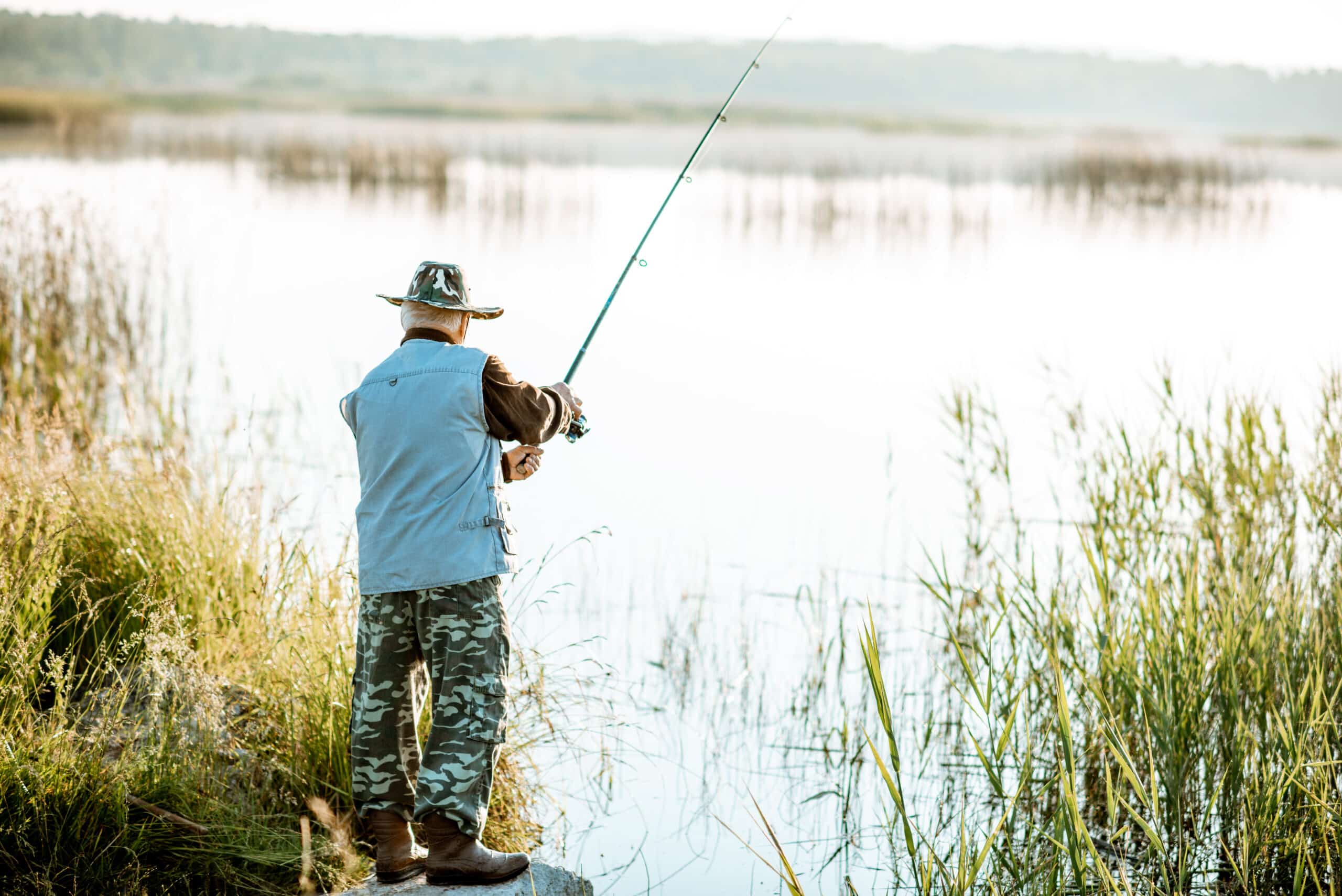 senior man fishing on the lake